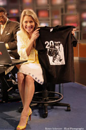 Fox 8 Morning show host Sefani Schaefer showing off her Colin Dussault's Blues Project 20th Anniversary T-Shirt